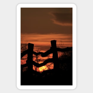 Wooden Fence with a colorful Kansas Sunset Sticker